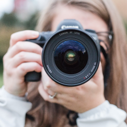 Jenna behind her camera